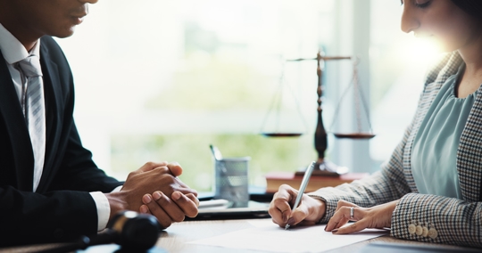 lawyer and client in a discussion